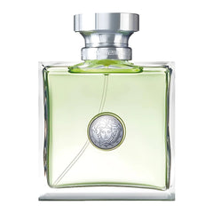 Green perfume bottle with silver cap on a white background