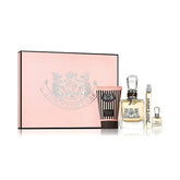 Juicy Couture perfume set with a pink gift box on a white background