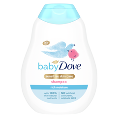 Baby Dove shampoo bottle with blue cap on a white background