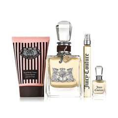 Juicy Couture perfume set with a bottle, cream, and smaller spray bottles on a white background